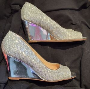 Women's sparkly wedge peep toe dress shoes. 3" heel.